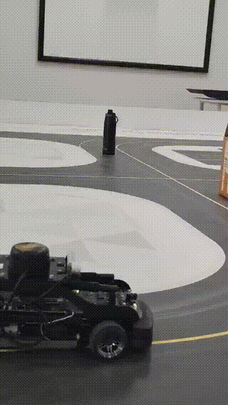 Animated GIF showing real-time car avoidance and lane tracking overlay